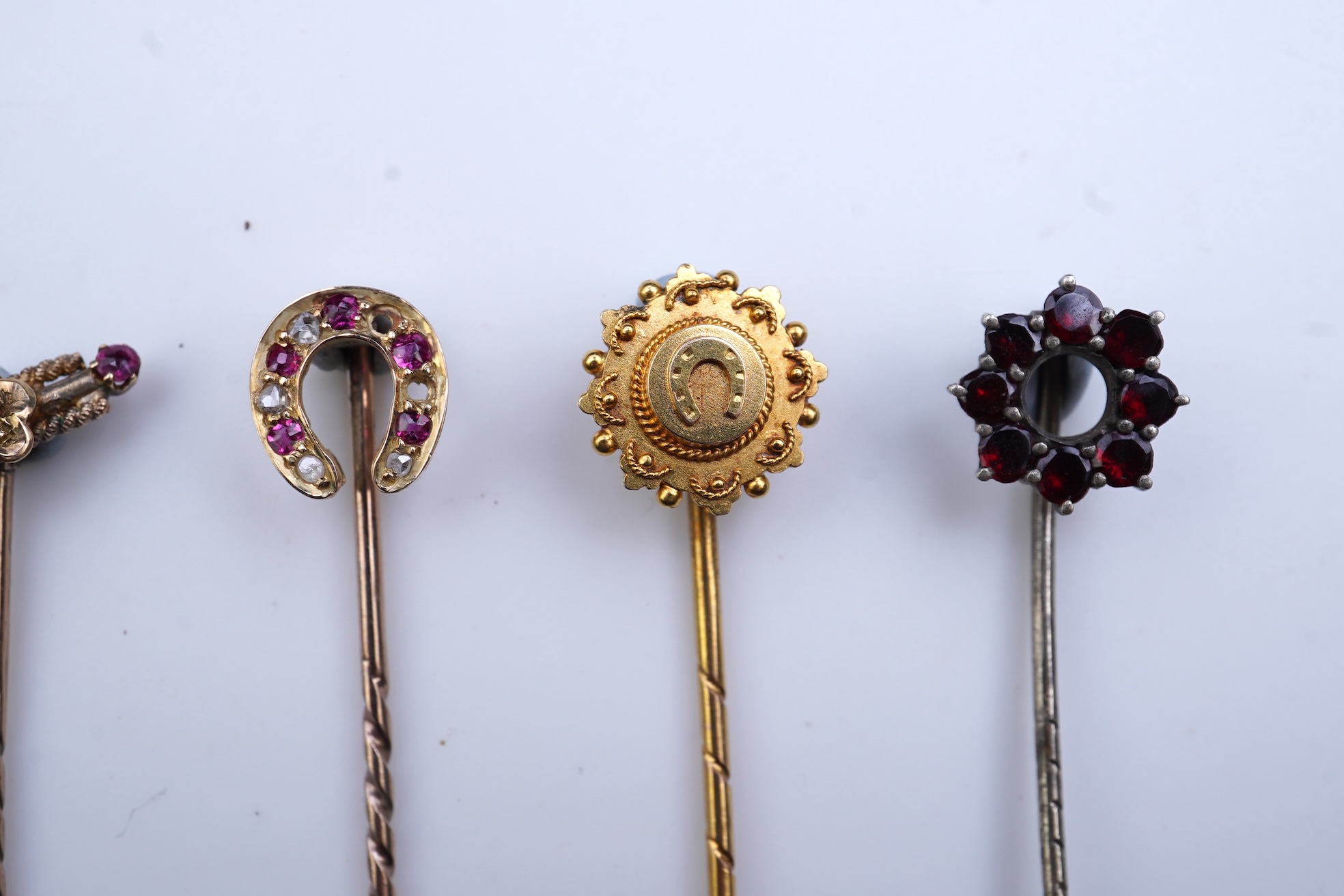 A collection of eight tie pins, 19th and 20th century